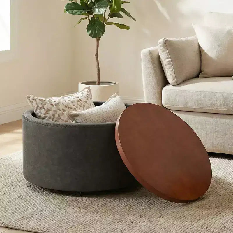 Pouf de rangement rond Camila moderne en bois et similicuir, avec roulettes et couvercle amovible