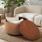 Pouf de rangement rond Camila moderne en bois et similicuir, avec roulettes et couvercle amovible