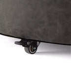 Pouf de rangement rond Camila moderne en bois et similicuir, avec roulettes et couvercle amovible