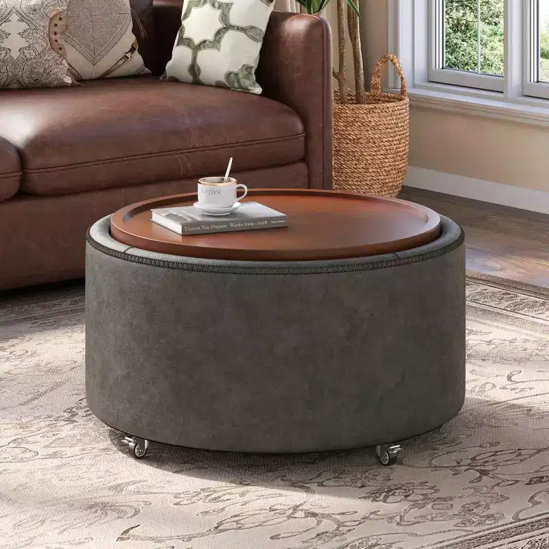 Pouf de rangement rond Camila moderne en bois et similicuir, avec roulettes et couvercle amovible